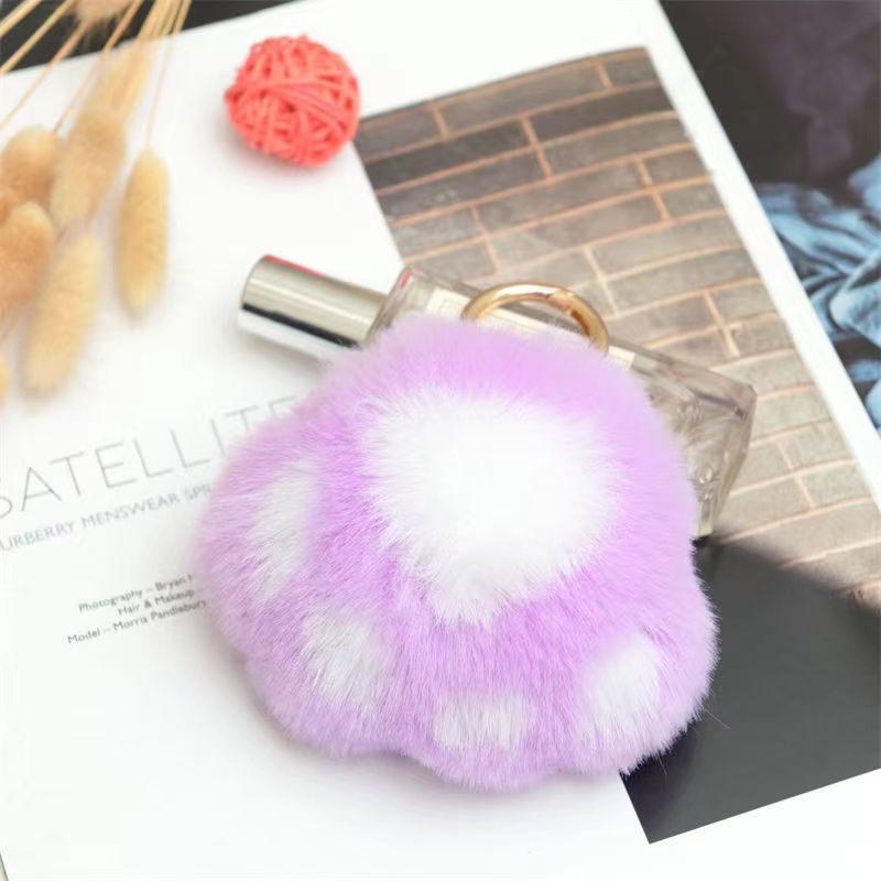 Llavero de peluche con forma de patita de gato