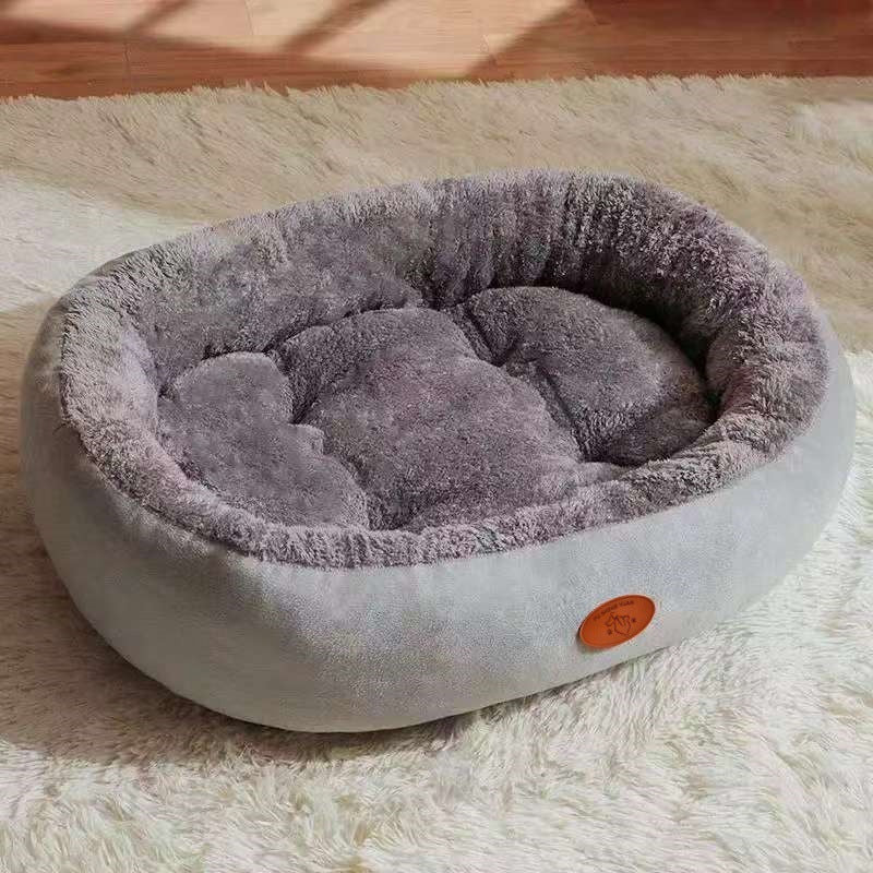 Cama ovalada transpirable para perros y gatos