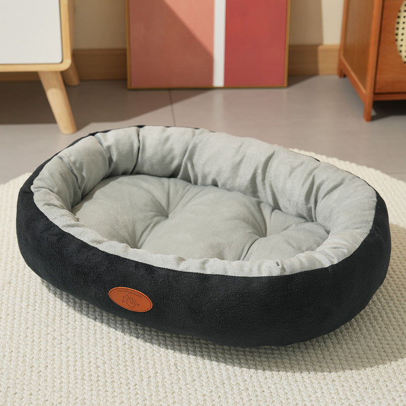 Cama ovalada transpirable para perros y gatos