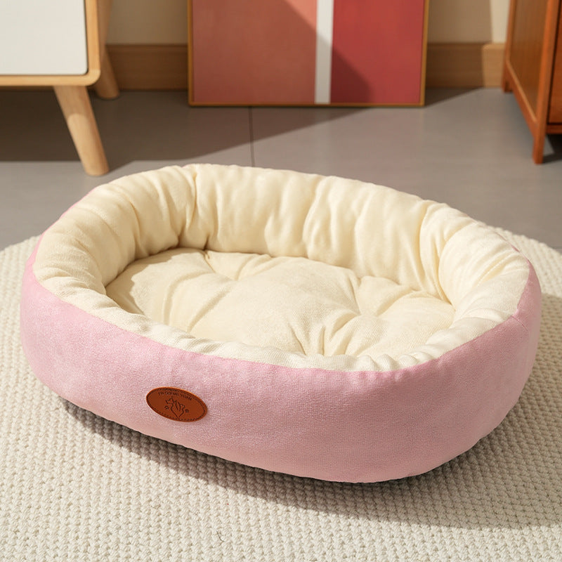 Cama ovalada transpirable para perros y gatos