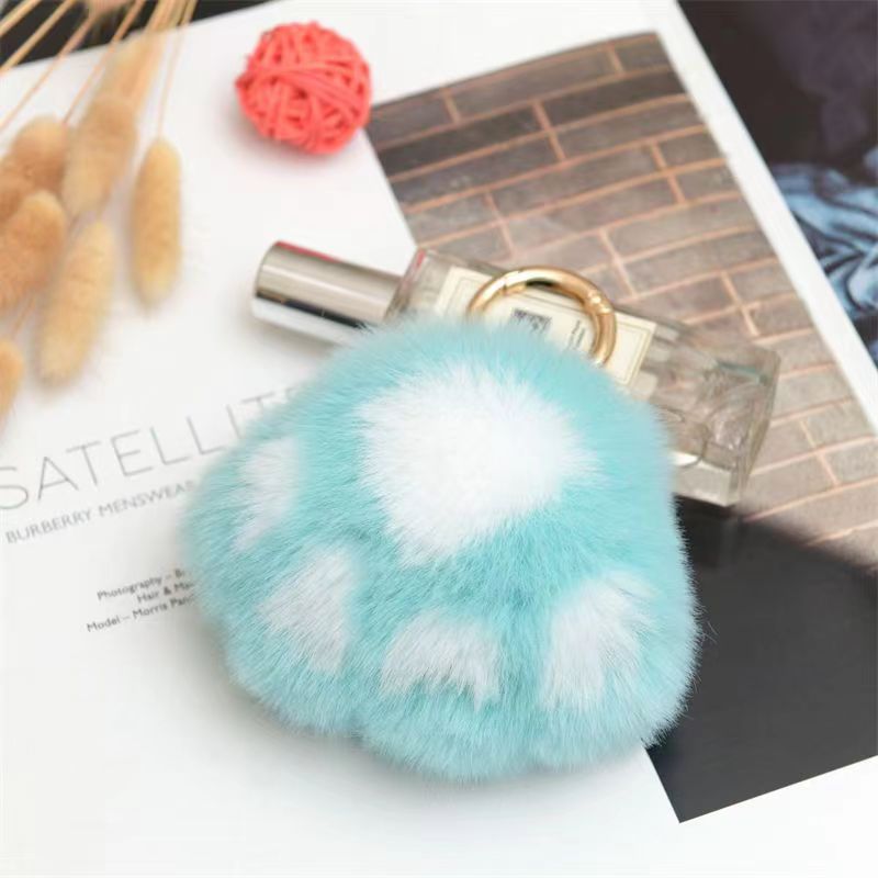 Llavero de peluche con forma de patita de gato