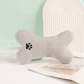Juguete de peluche en forma de hueso para perros y gatos
