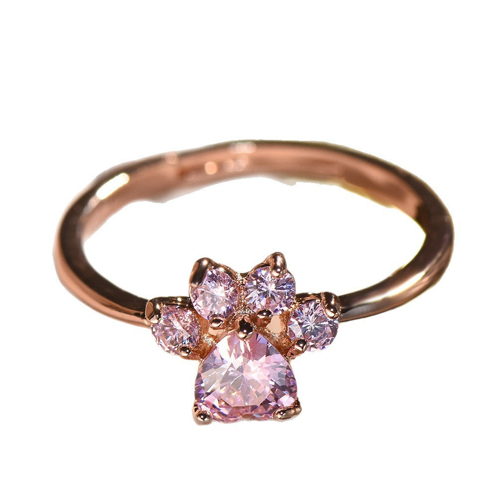 Anillo ajustable con huella de gato y circonitas