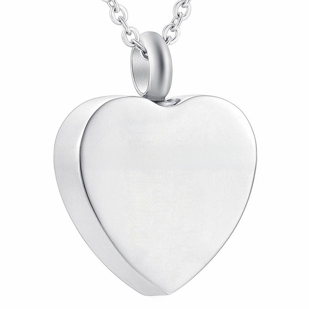 Colgante para cenizas de mascota en forma de corazón con huella grabada