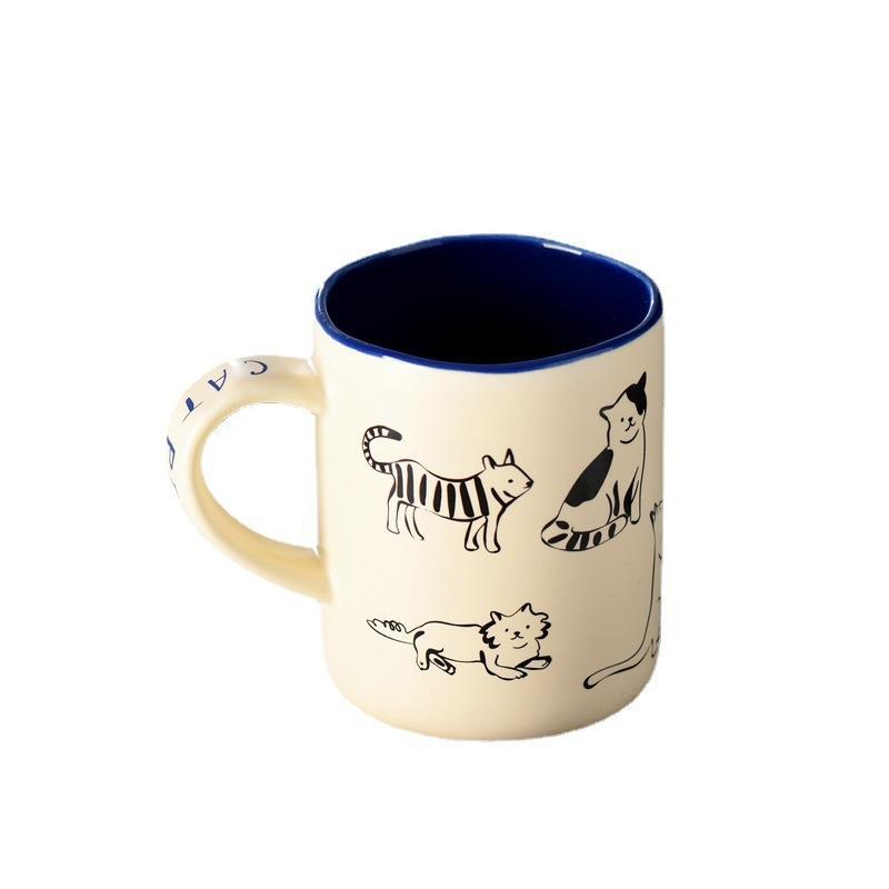 Taza de cerámica con perros y gatos de dibujos
