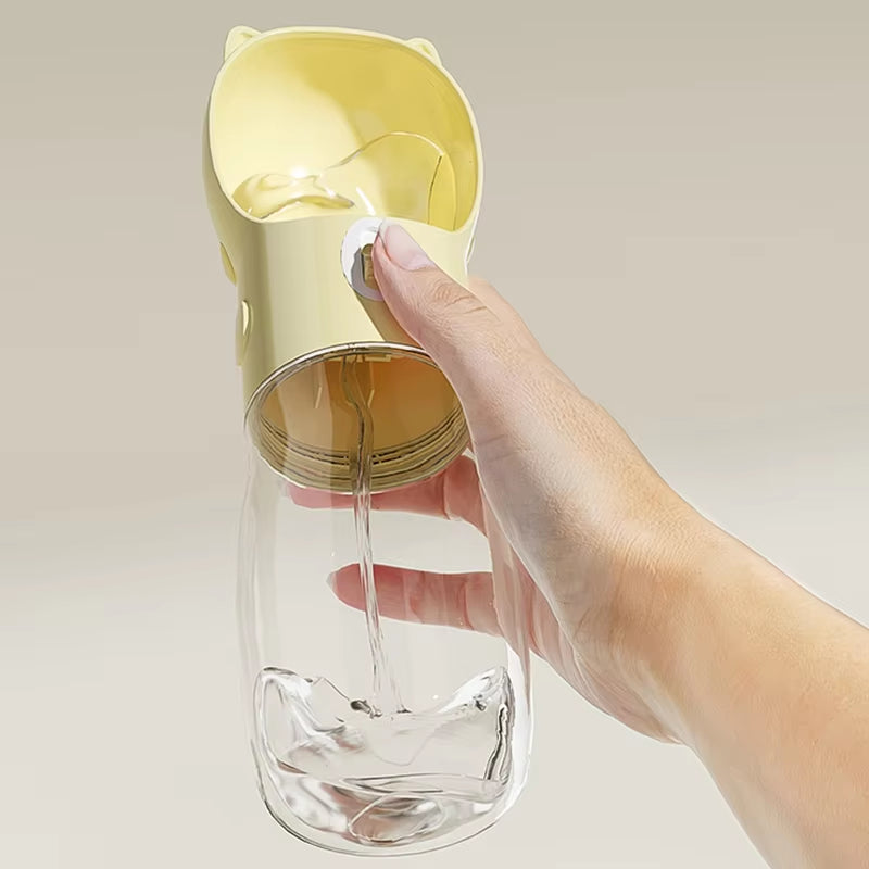 Botella portátil de agua y comida para perros y gatos