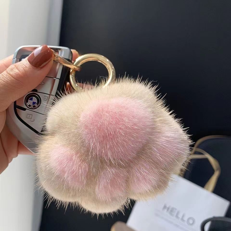 Llavero de peluche con forma de patita de gato