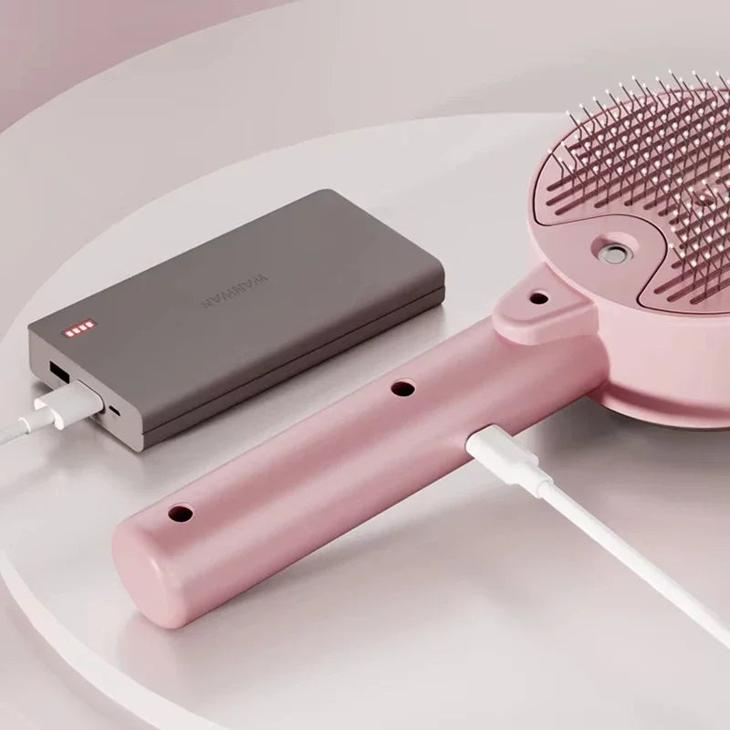 Cepillo eléctrico con spray para perros y gatos