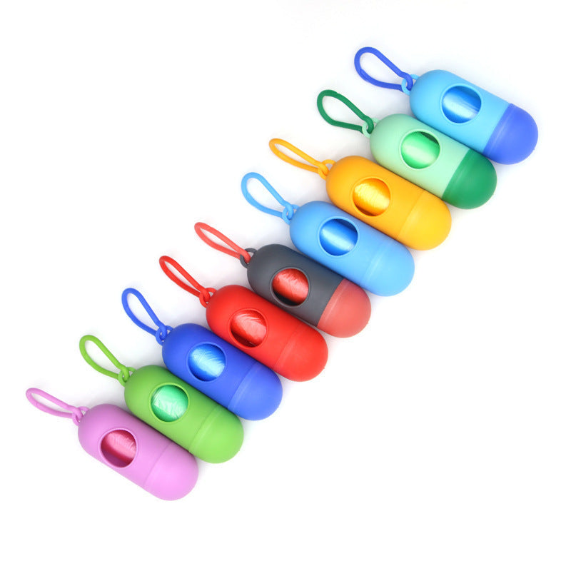 Cápsula dispensadora para bolsas de excrementos