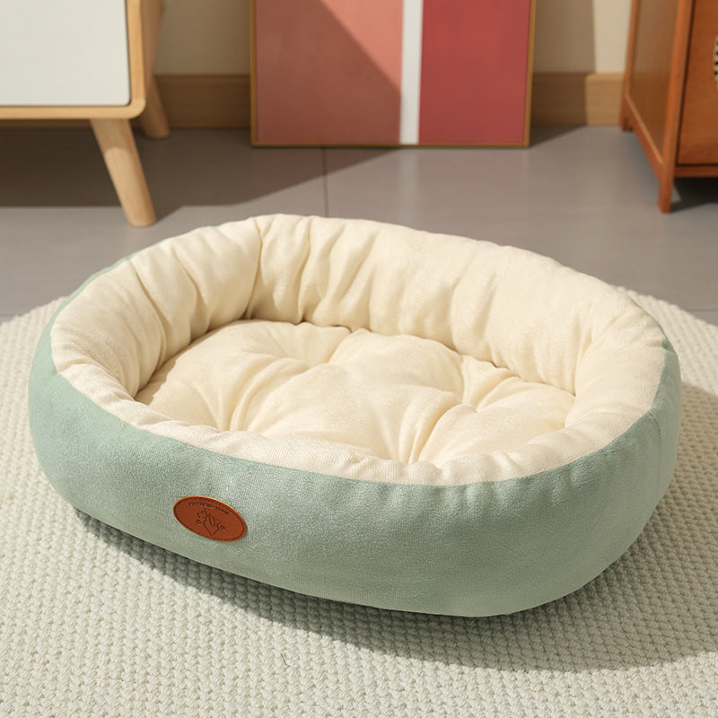 Cama ovalada transpirable para perros y gatos