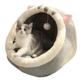 Cama tipo cueva semiencerrada para gatos