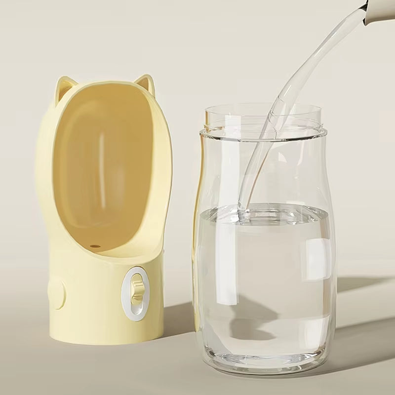 Botella portátil de agua y comida para perros y gatos