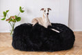 Cama ovalada de piel de oveja negra Mellow, de 50 cm a 130 cm