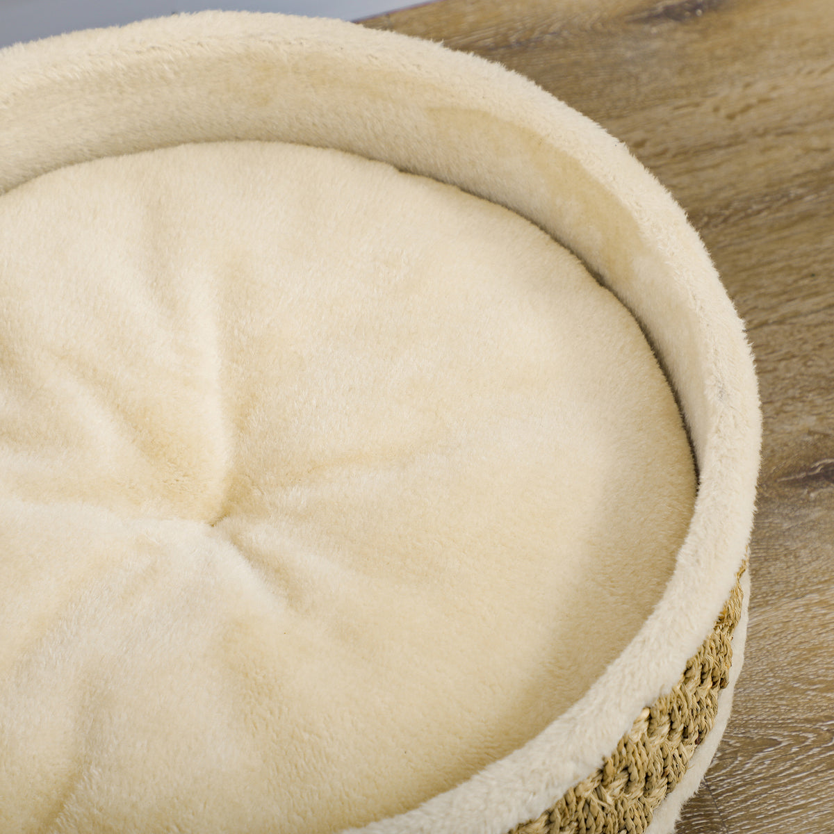 Cama redonda elevada para perros y gatos con cojín beige