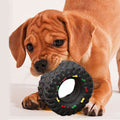 Juguete de goma con forma de rueda y sonido para perros