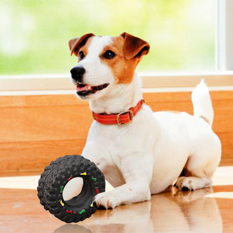 Juguete de goma con forma de rueda y sonido para perros