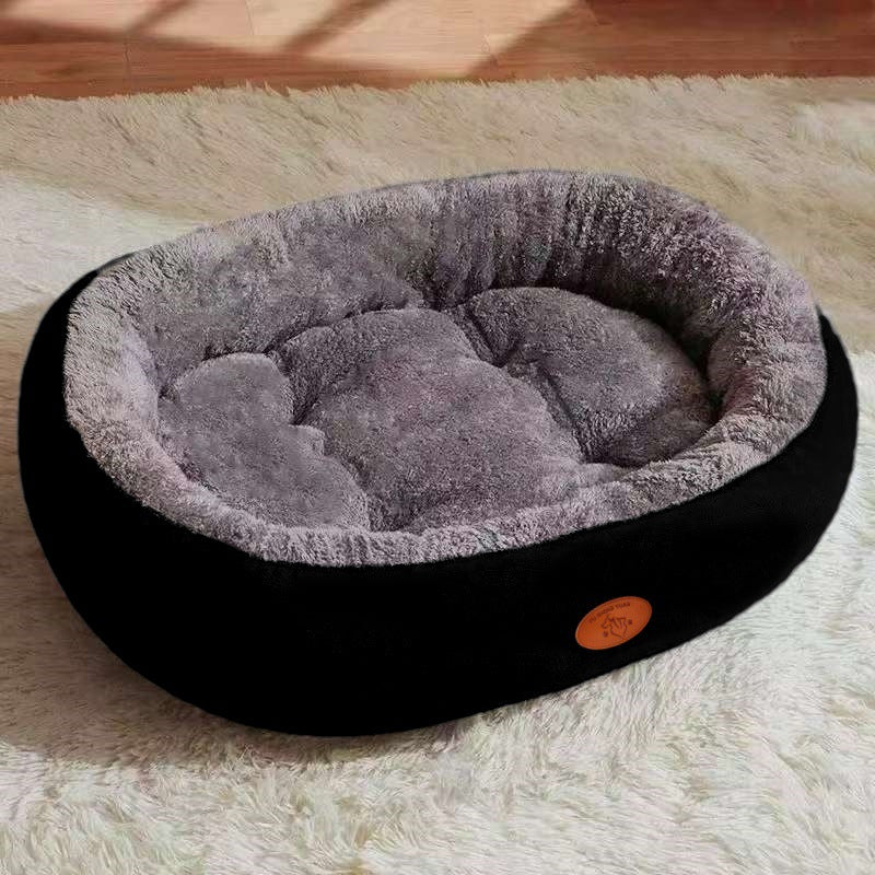 Cama ovalada transpirable para perros y gatos