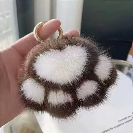 Llavero de peluche con forma de patita de gato