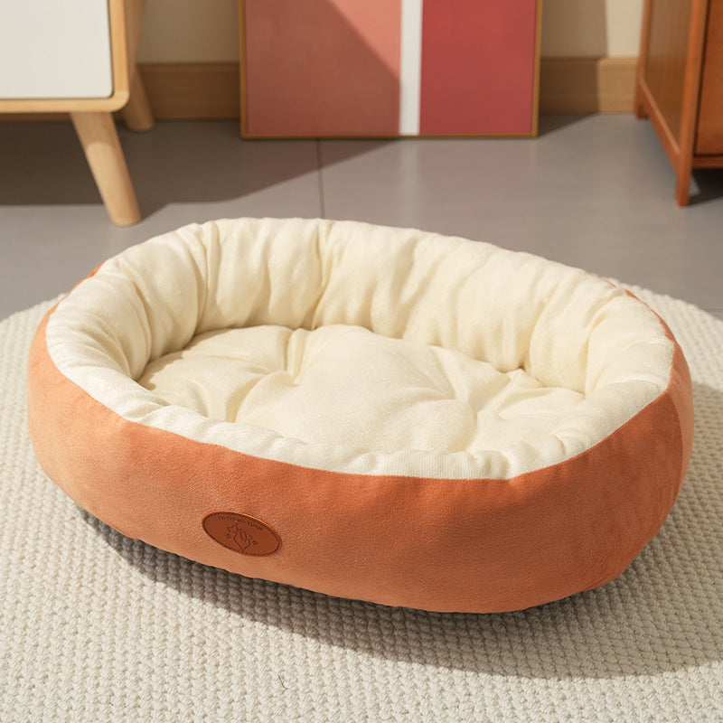 Cama ovalada transpirable para perros y gatos