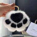 Llavero de peluche con forma de patita de gato