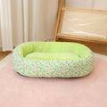 Cama acolchada con estampado de flores para perros y gatos