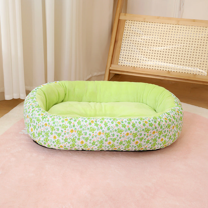 Cama acolchada con estampado de flores para perros y gatos