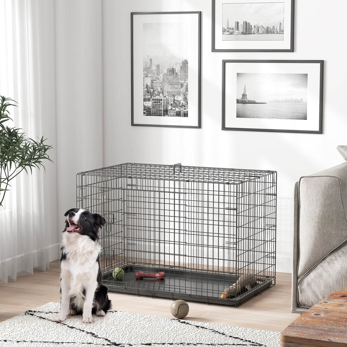 Jaula plegable de transporte para perros de acero negro